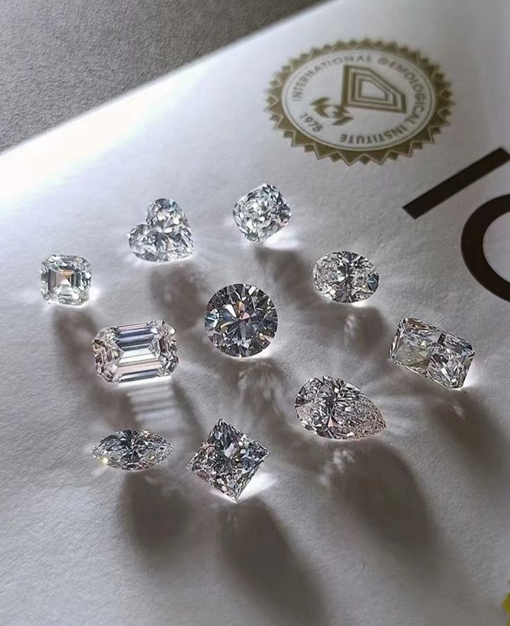 Collection of lab-grown diamond shapes arranged in a studio